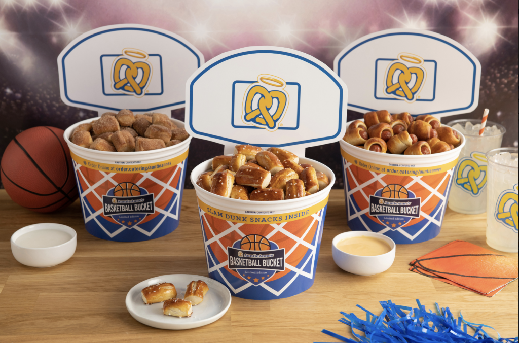 Auntie Anne's:

Limited edition “free throw buckets” packed with pretzel nuggets are available for $19.99 (or three for $54.99) from March 18 - April 8. Choose from the following four flavors: original, cinnamon sugar, mini pretzel dogs or pepperoni. Also, from March 21-24, March 28-31 and April 6-8, you’ll get free delivery on top of that.